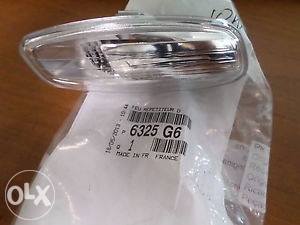 Zmigavac retrovizora desni Peugeot pezo 207 06-