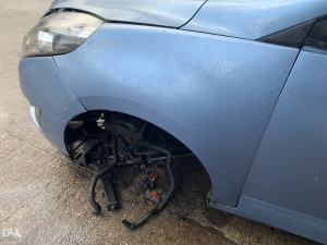 Blatobran lijevi prednji Renault Grand Scenic 2012 (fotografija 3)