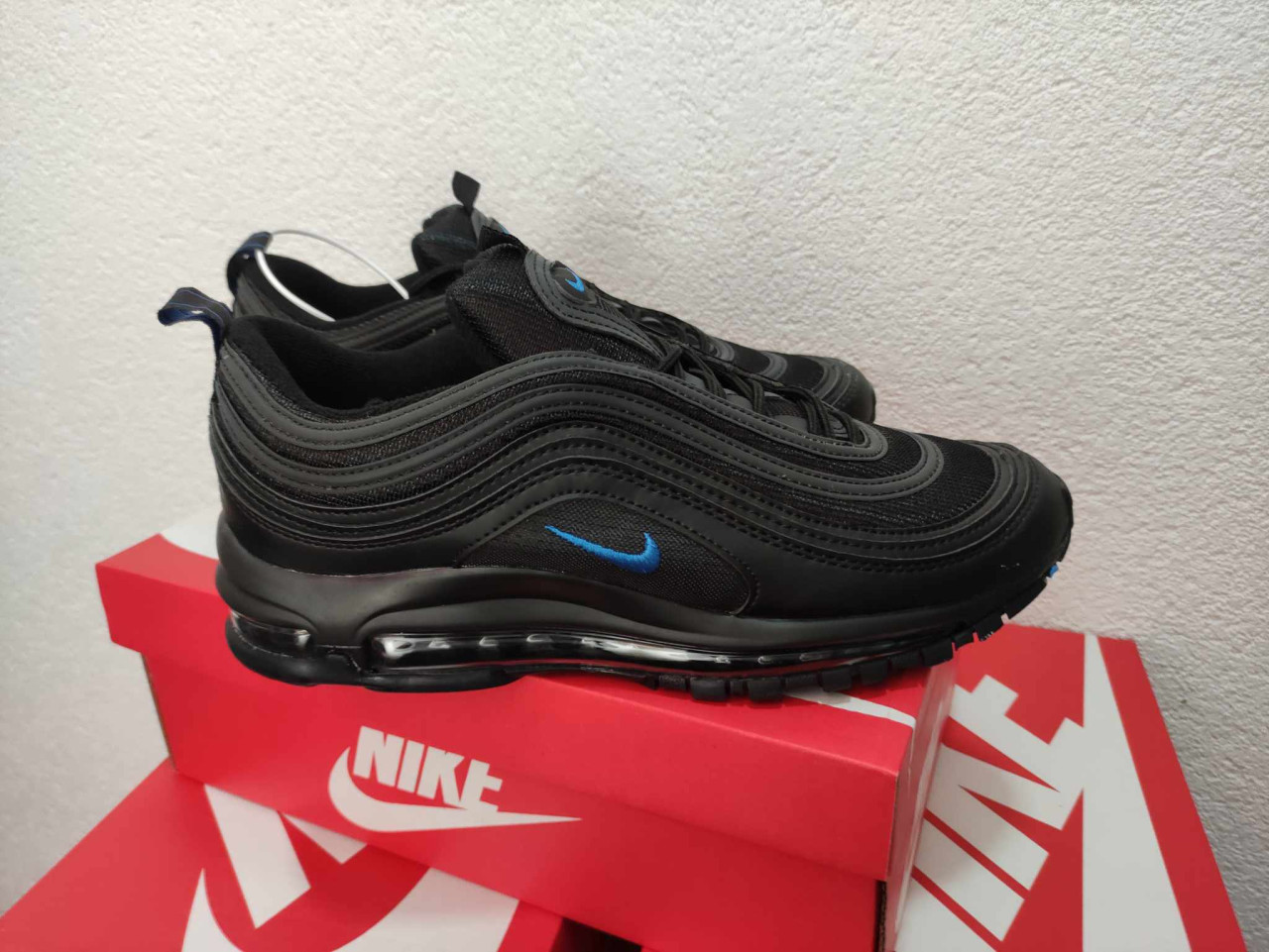 black 97s blue tick