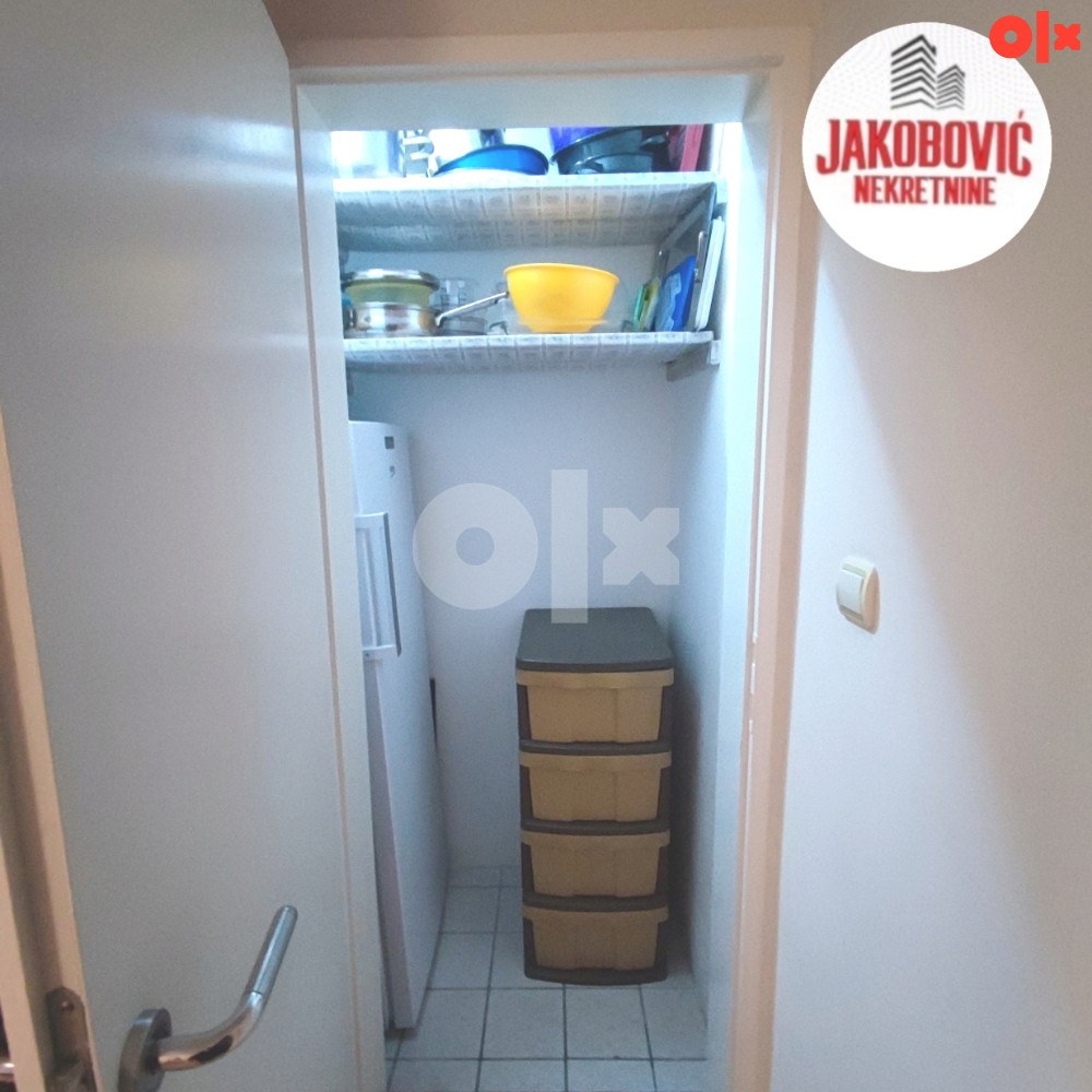 Trosoban stan u centru grada,81m2 11