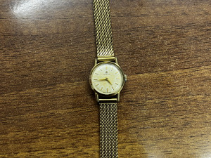 Omega sat kućište pozlaćeno