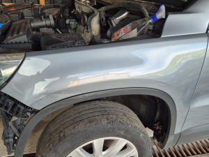 W Tiguan lijevi blatobran 063 339 996