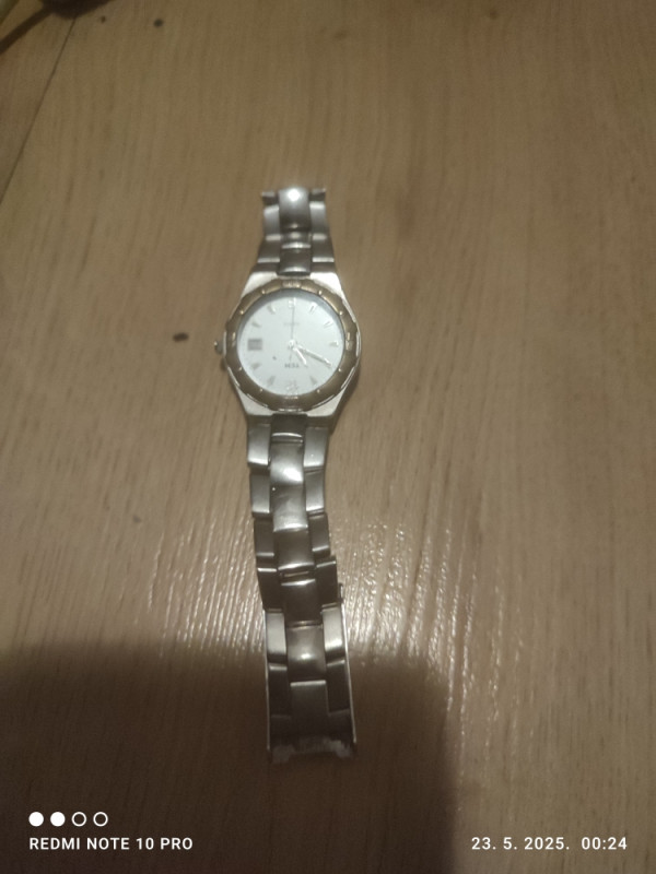 TCM zenski rucni sat s datumom