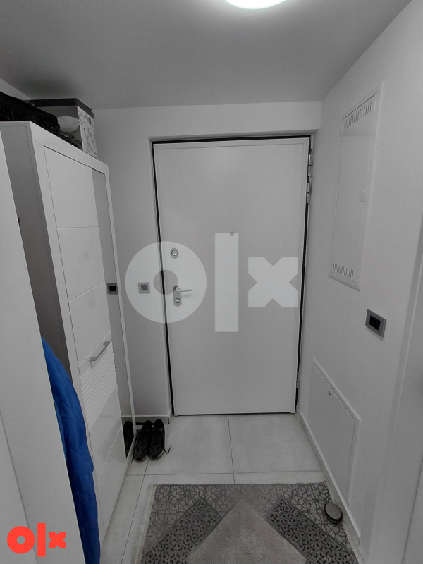 Stan Tuzla 70m2 + garaža 19