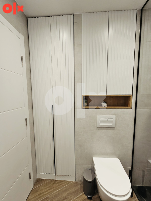 Novogradnja u centru - potpuno sređen trosoban stan 67m2 14
