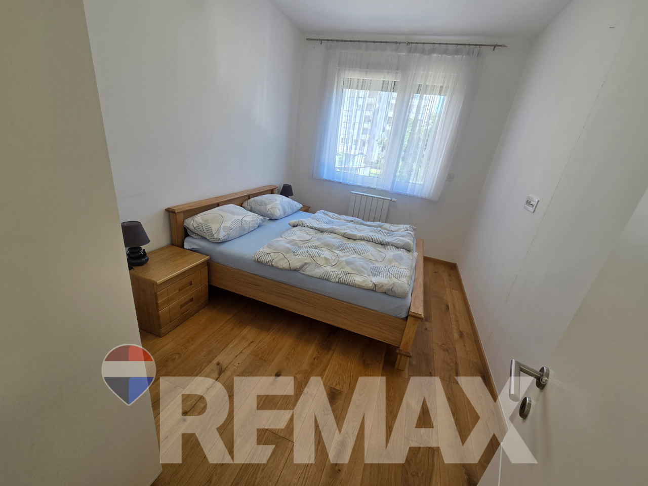 Nov trosoban stan 63m2, centar, garaža uključena, dvorište 6