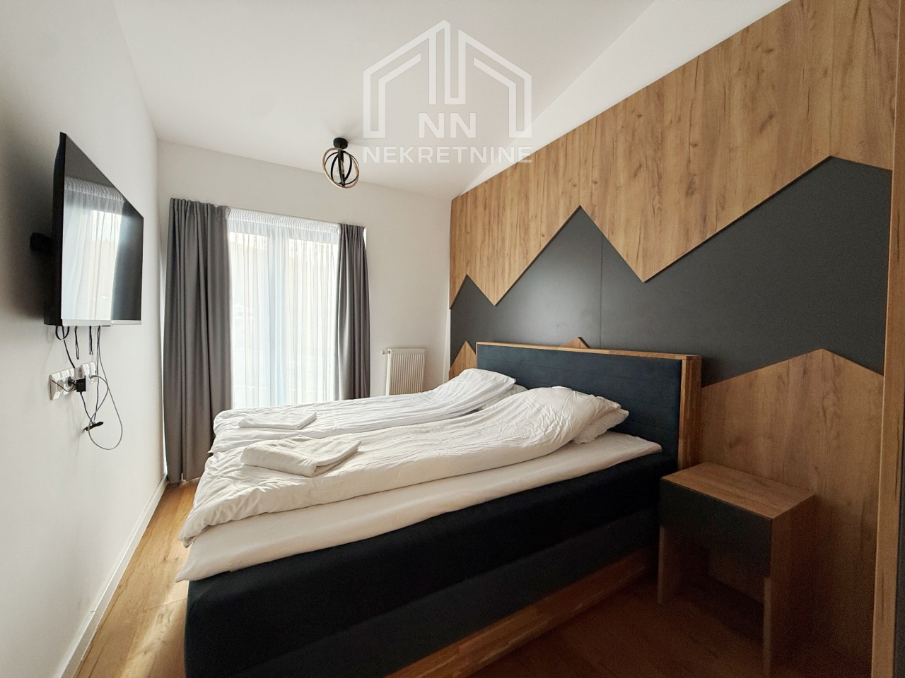 NN Nekretnine : Dvosoban apartman 45,6m2 sa garažom - Bjelašnica 10