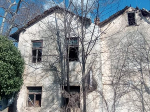 House with land in Domanovići
