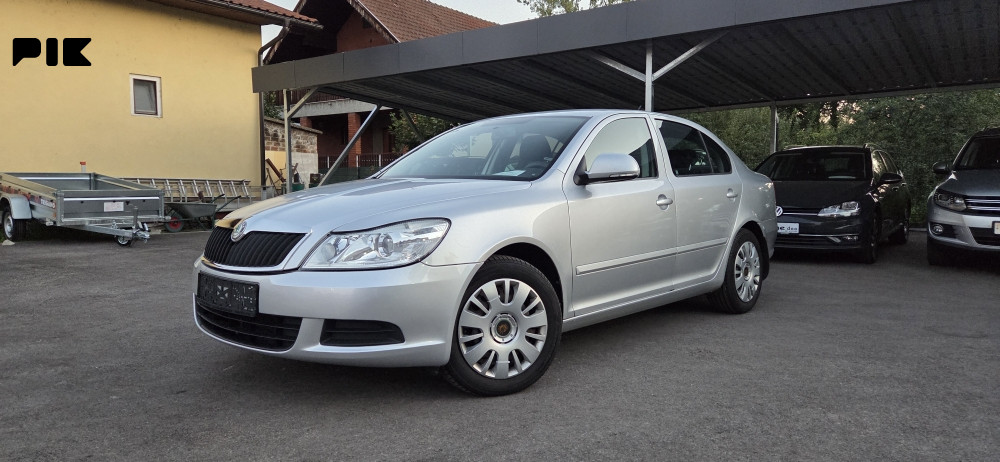 Škoda Octavia 2011 godina 1.9 tdi 77kw - slika 2