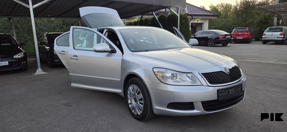 Škoda Octavia 2011 godina 1.9 tdi 77kw - slika 13