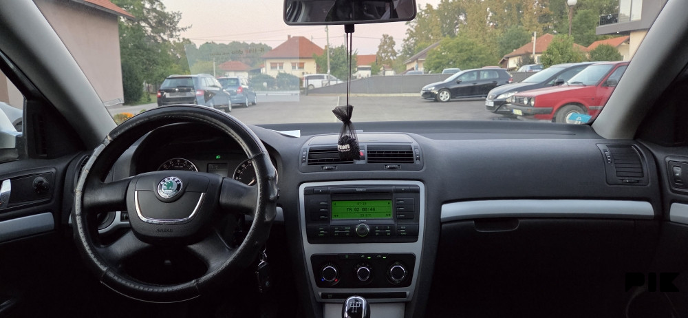 Škoda Octavia 2011 godina 1.9 tdi 77kw - slika 14