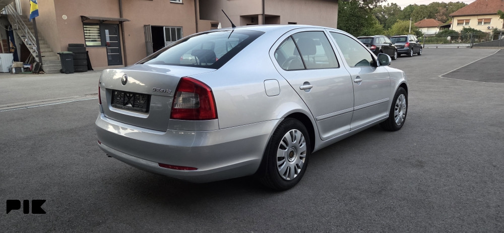 Škoda Octavia 2011 godina 1.9 tdi 77kw - slika 11