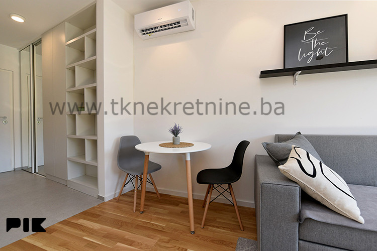 NOVOGRADNJA - Dizajnerski uređena garsonjera 26 m2, sa parkingom 7