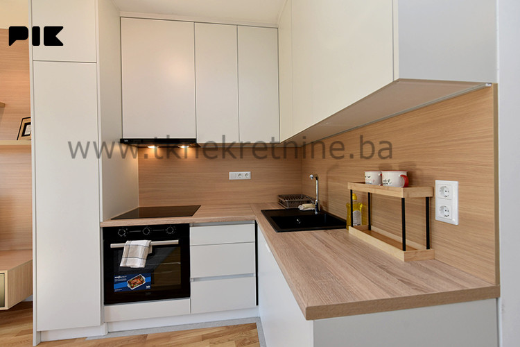 NOVOGRADNJA - Dizajnerski uređena garsonjera 26 m2, sa parkingom 9