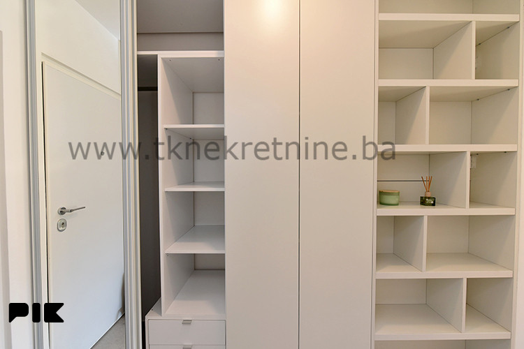 NOVOGRADNJA - Dizajnerski uređena garsonjera 26 m2, sa parkingom 14