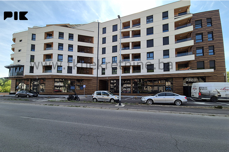 NOVOGRADNJA - Dizajnerski uređena garsonjera 26 m2, sa parkingom 23