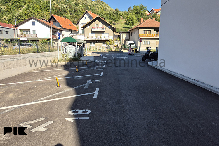 NOVOGRADNJA - Dizajnerski uređena garsonjera 26 m2, sa parkingom 24