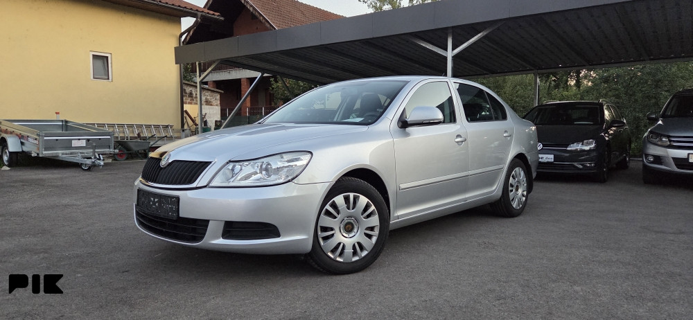 SKODA OKTAVIA SIVA 2011 GODINA 1.9 TDI 77KW - slika 7