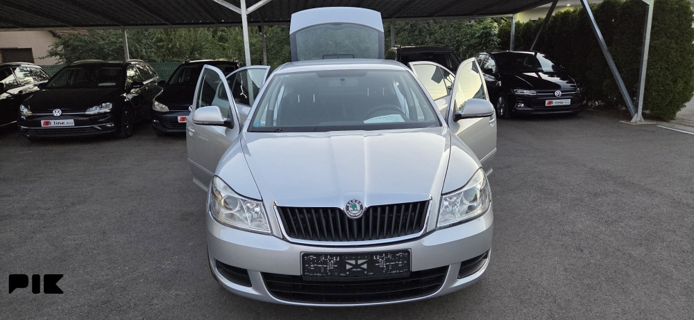 SKODA OKTAVIA SIVA 2011 GODINA 1.9 TDI 77KW - slika 9