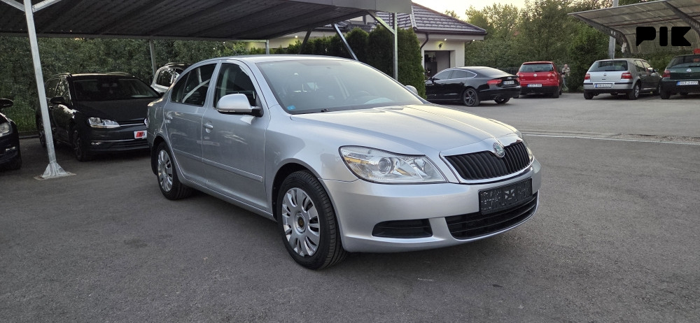 SKODA OKTAVIA SIVA 2011 GODINA 1.9 TDI 77KW - slika 14