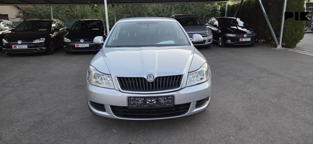 SKODA OKTAVIA SIVA 2011 GODINA 1.9 TDI 77KW - slika 15