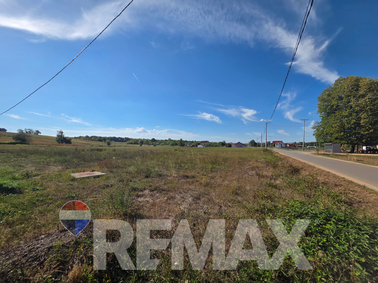 Plac 7500m2, Jaružani, uz asfalt, moguće parcelisanje po dogovoru