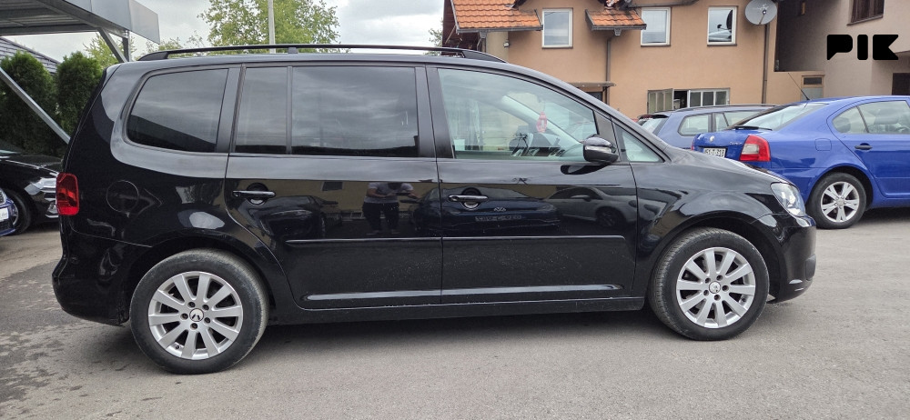 Volkswagen Touran 2011 godina 1.6 tdi 77kw. - slika 8